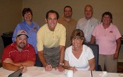 Board members of the new Pacific-West Fastener Association sign the document creating the association. Front row: Dee Silver, Kelly Cole, WCL Co.; and Beth VanZandt, Duncan Bolt. Back row: Suzanne Dukes, Hayes Bolt; John Wachman, Desert Distribution; and Terry O'Barski, Hayes Bolt (photo courtesy Pac-West).